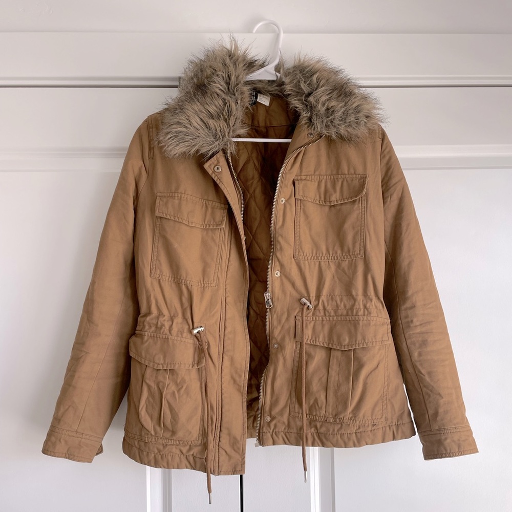 Divided brown fur hooded coat